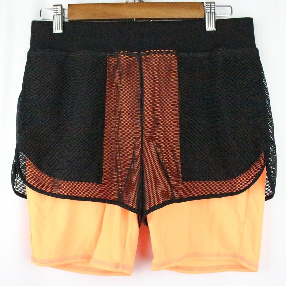 Theory 38 Mesh over Biker Athletic Shorts.